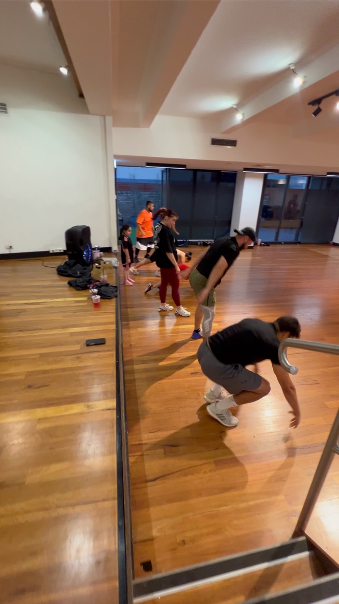 A Liverpool Nutrition FitClub group completing a floor exercise